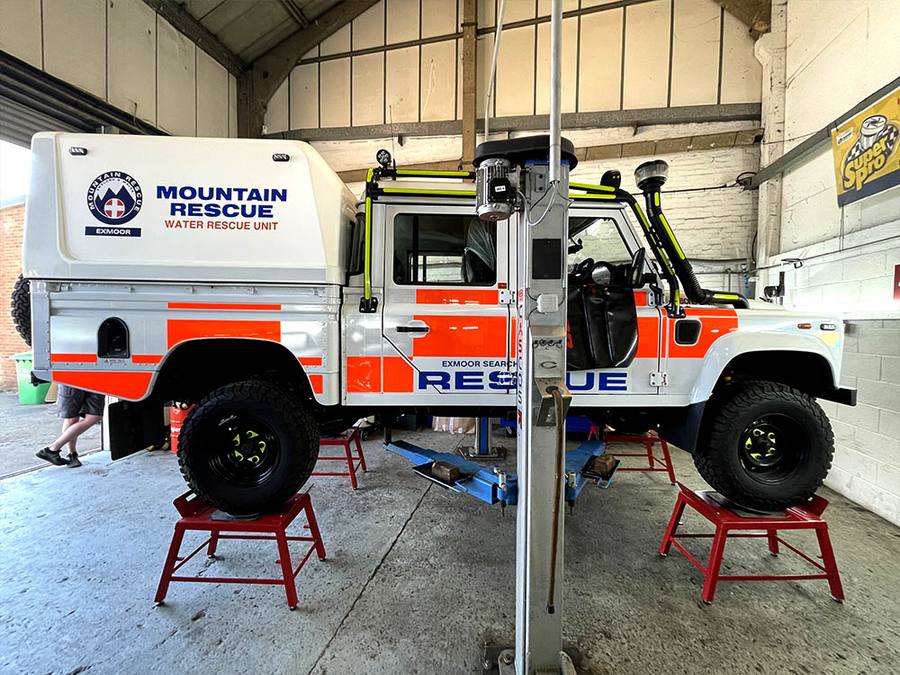 Mountain rescue off-road vehicle being serviced in the garage
