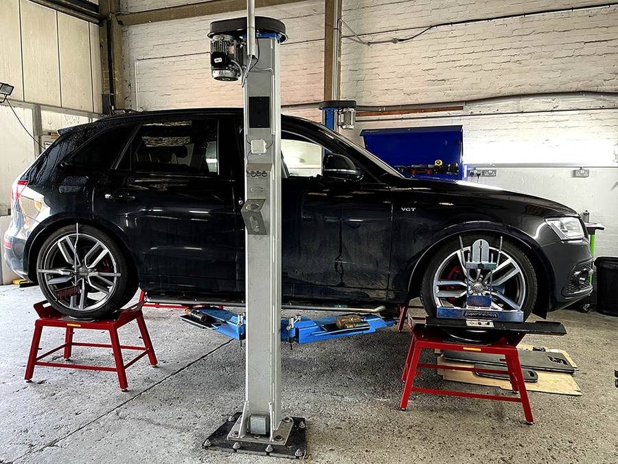 A car being serviced inside the Performance Driven workshop