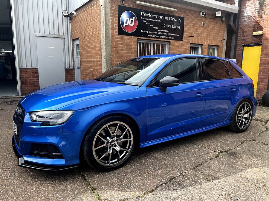 Blue Audi outside the Performance Driven garage